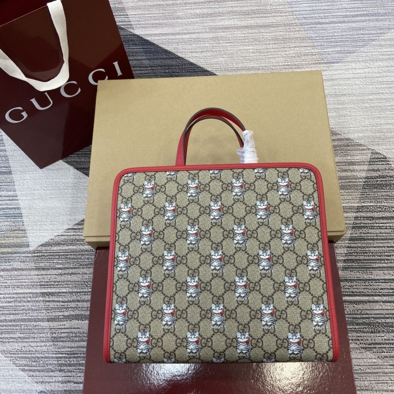 G*u*i shopping bags